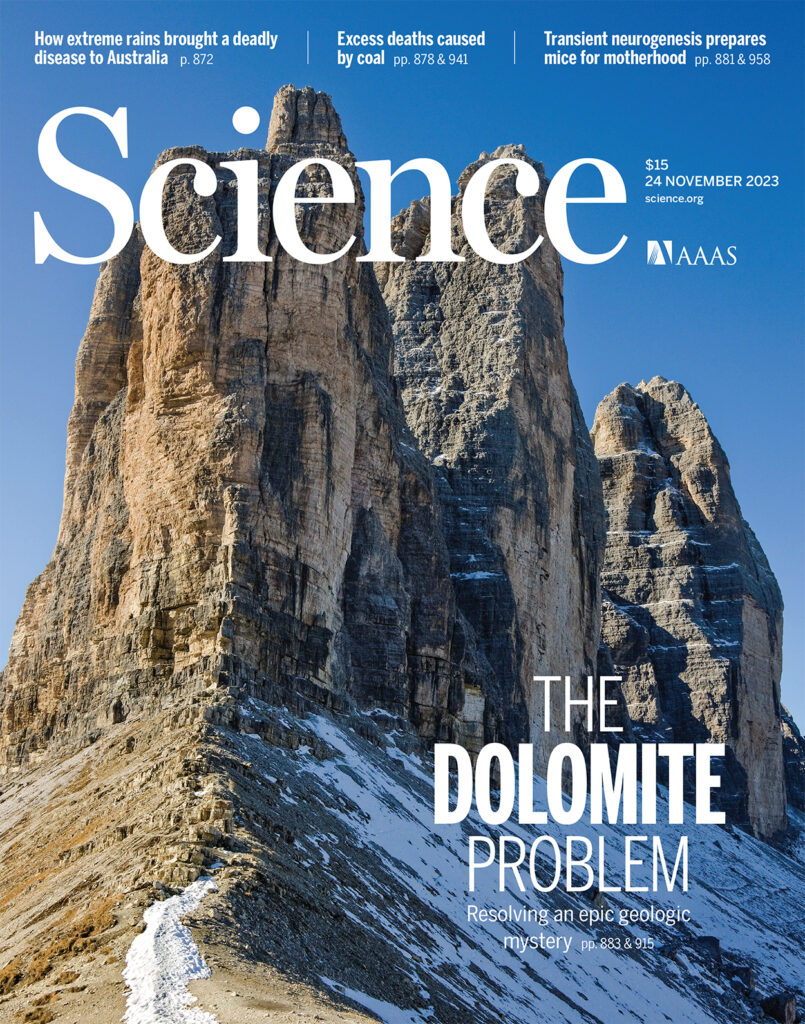 Science Magazine Cover, that says "The Dolomite Problem," teasing Wenhao Sun's article. The cover image is a rock formation.