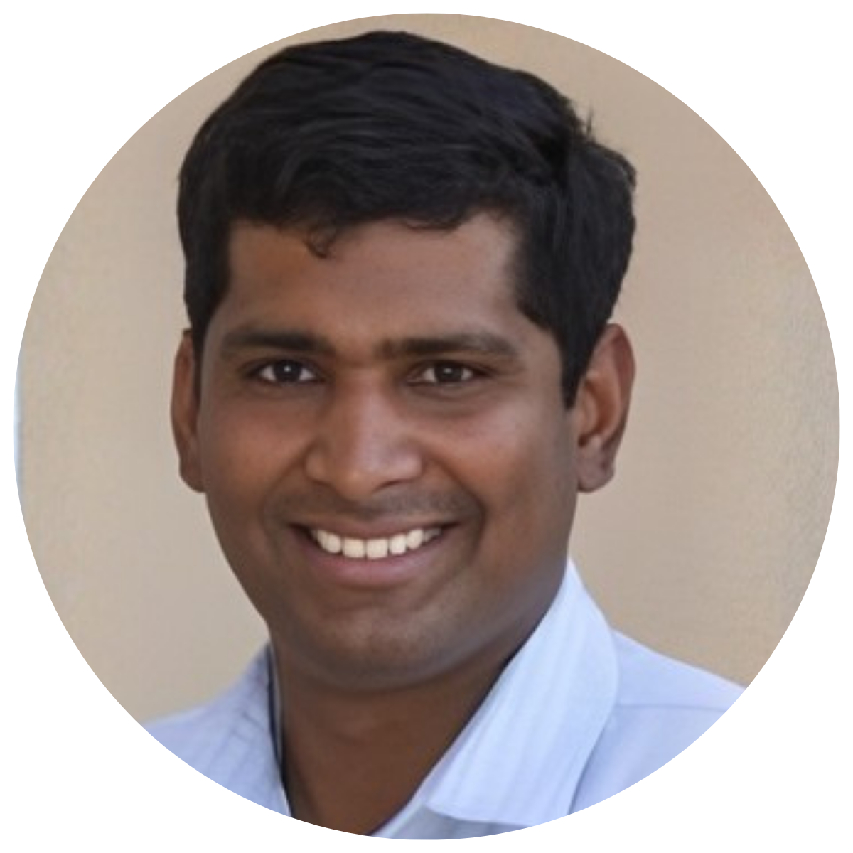 Sivasankaran Rajamanickam (1) Man in light blue shirt smiling.