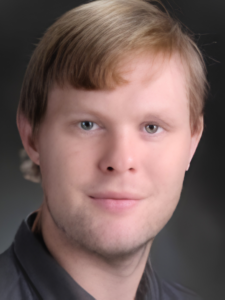 Man with blond hair wearing black shirt