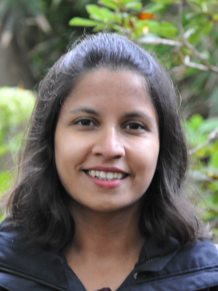 Woman in black shirt smiling